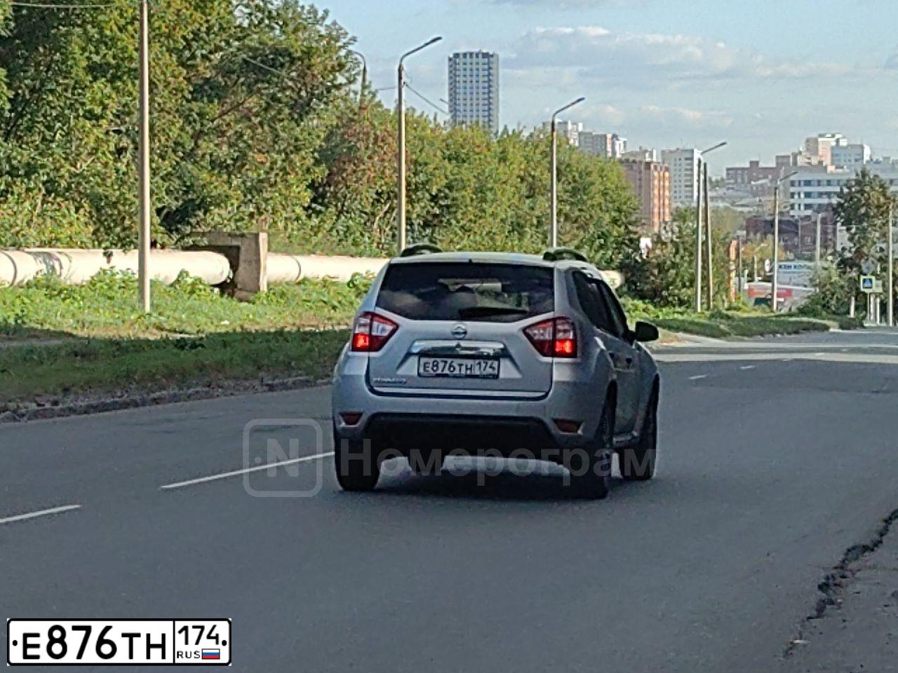 Фото автомобиля NISSAN TERRANO, 2015 — госномер Е876ТН174. Цвет: серебристый