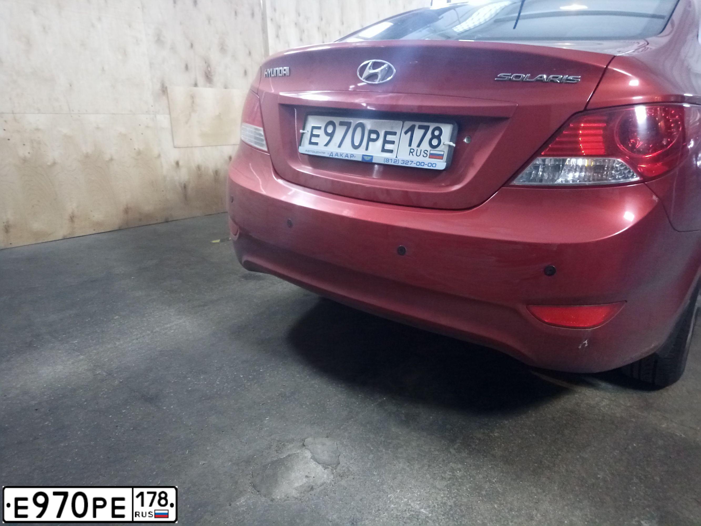 Фото автомобиля HYUNDAI SOLARIS, 2011 — госномер Е970РЕ178. Цвет: КРАСНЫЙ ГРАНАТ