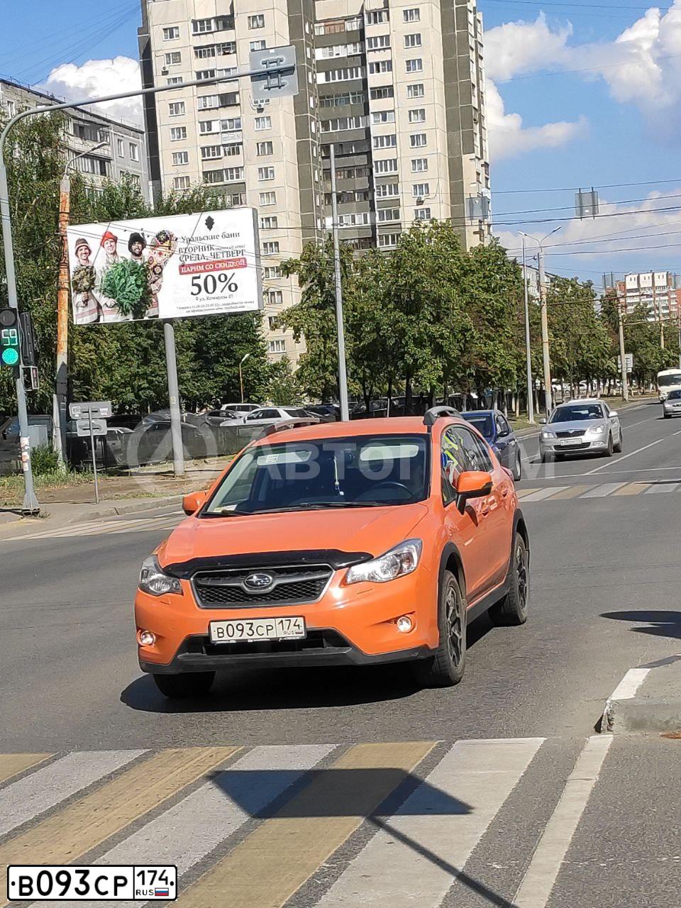 Фото автомобиля SUBARU IMPREZA, 2013 — госномер В093СР174. Цвет: ОРАНЖЕВЫЙ