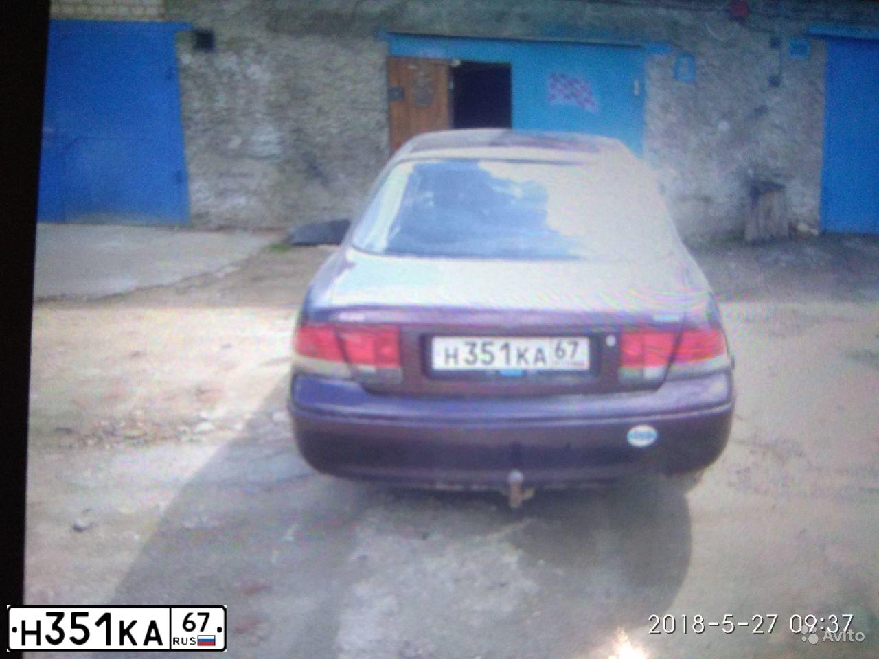 Фото автомобиля MAZDA 626, 1993 — госномер Р915МС40. Цвет: ВИШНЕВЫЙ