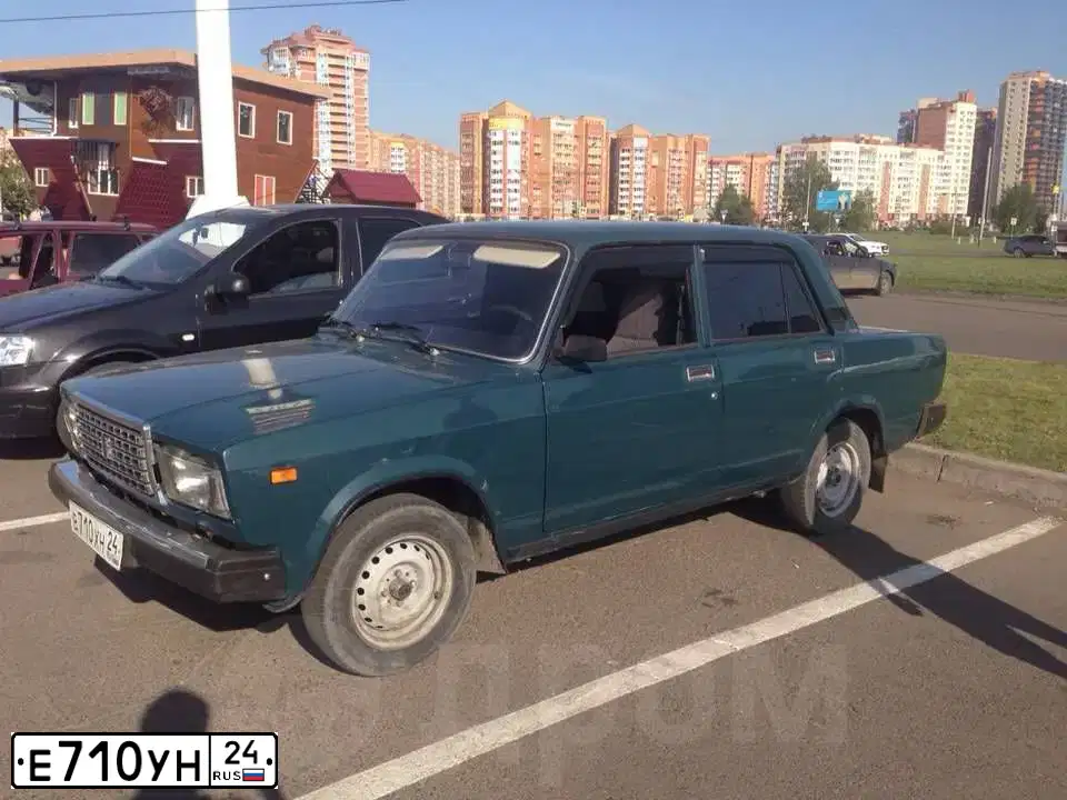 Фото автомобиля BMW X5, 2005 — госномер Е710УН24. Цвет: Серый