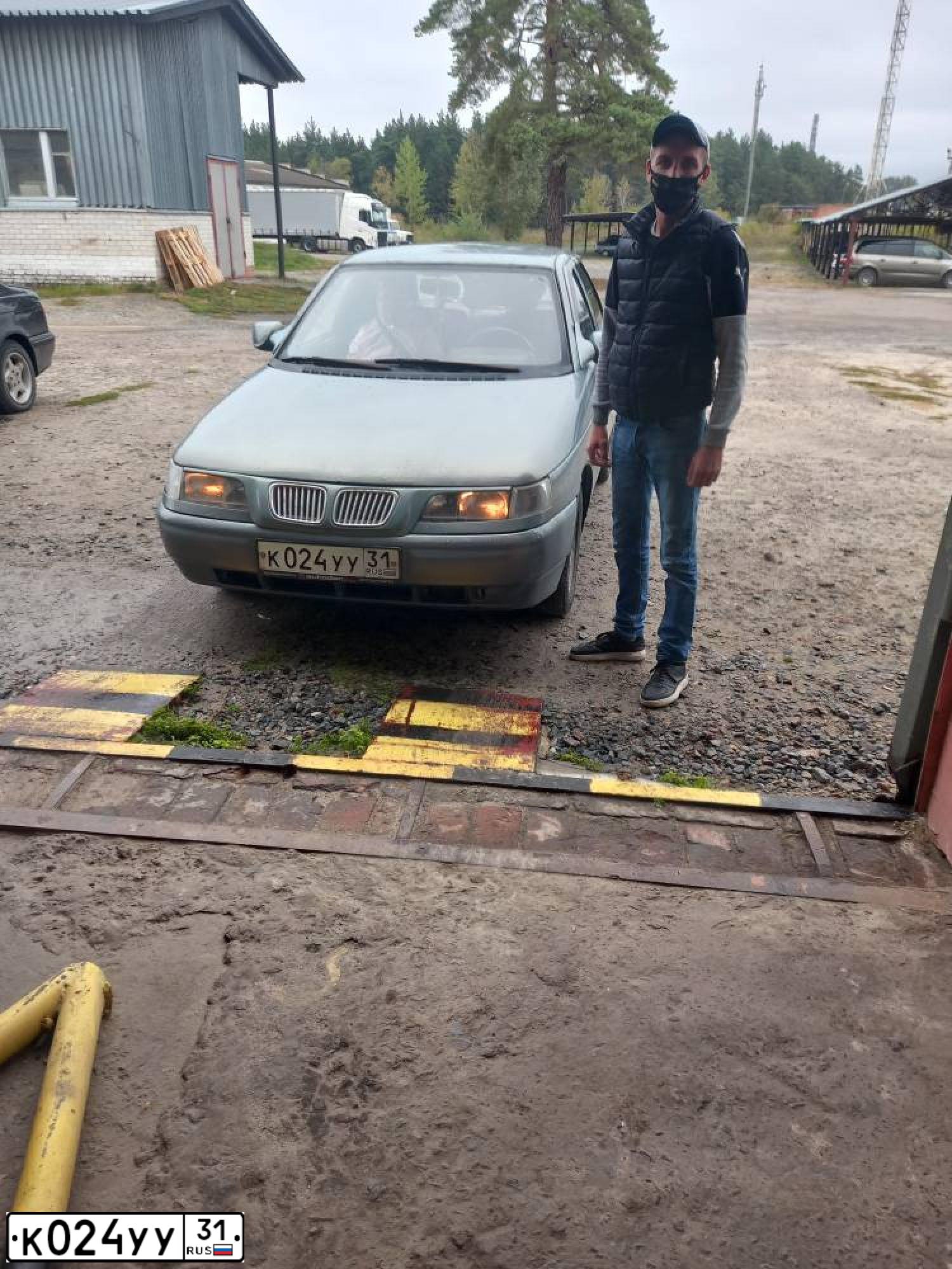 Фото автомобиля LADA 2110, 2001 — госномер К024УУ31. Цвет: СЕРЫЙ ЗОЛОТИСТЫЙ