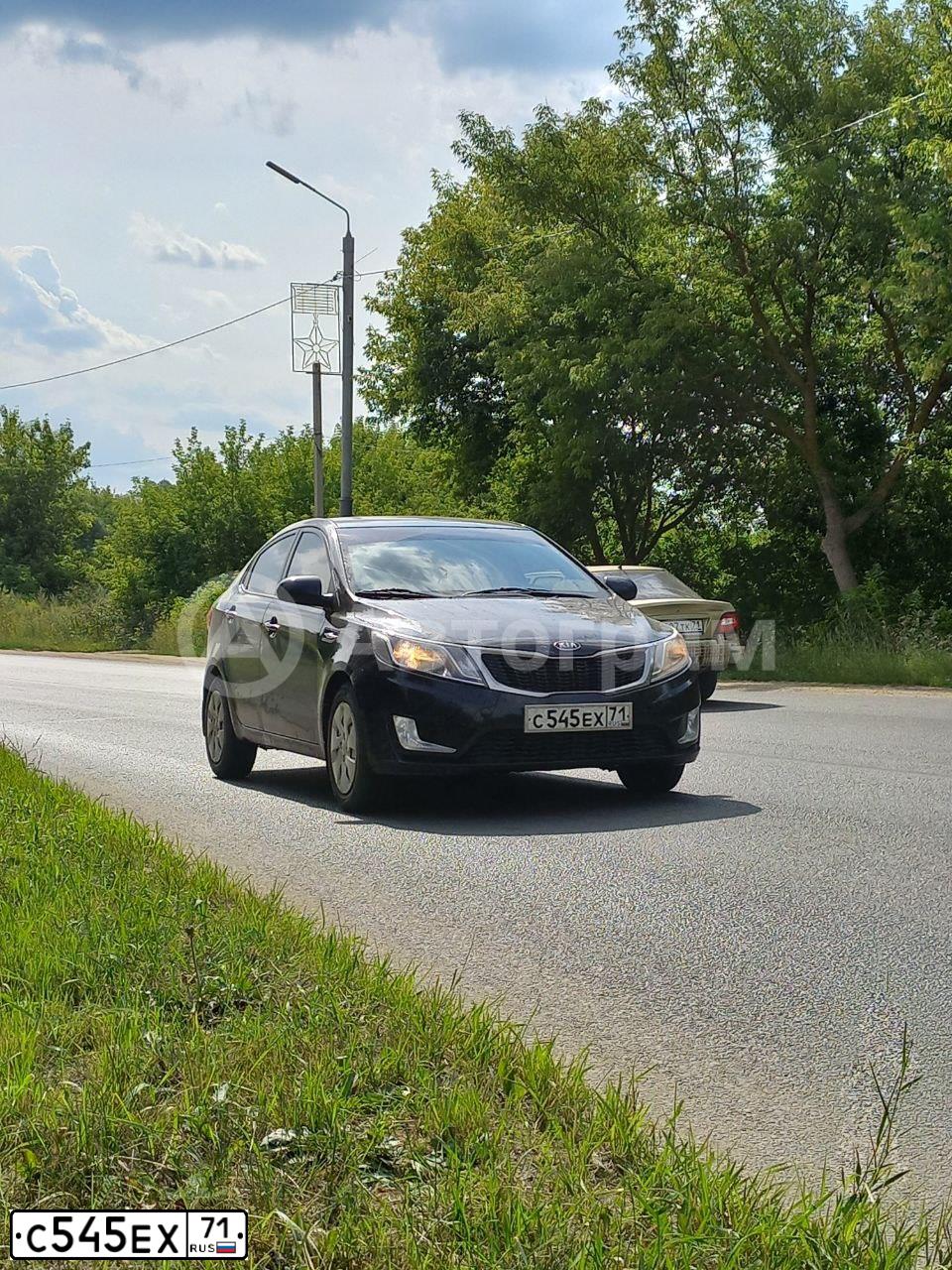 Фото автомобиля KIA RIO, 2012 — госномер С545ЕХ71. Цвет: ЧЕРНЫЙ