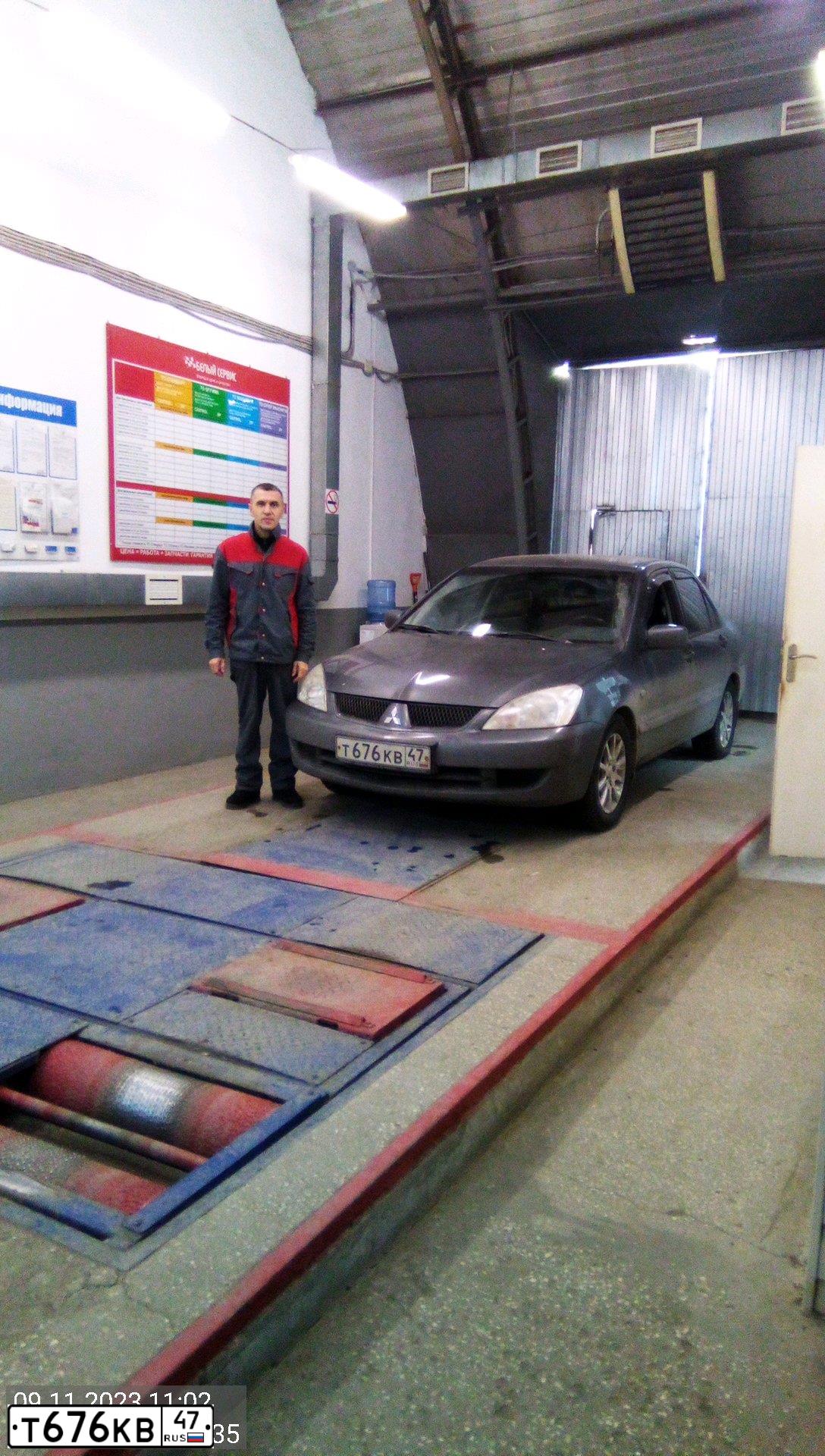 Фото автомобиля MITSUBISHI LANCER, 2006 — госномер Т676КВ47. Цвет: СЕРЫЙ