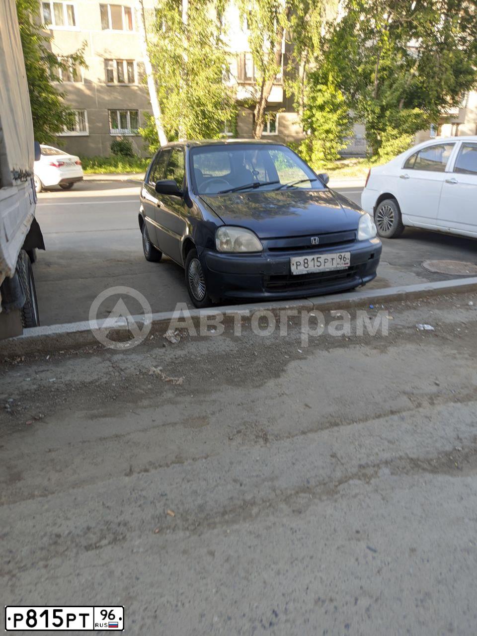 Фото автомобиля HONDA LOGO, 1999 — госномер Р815РТ96