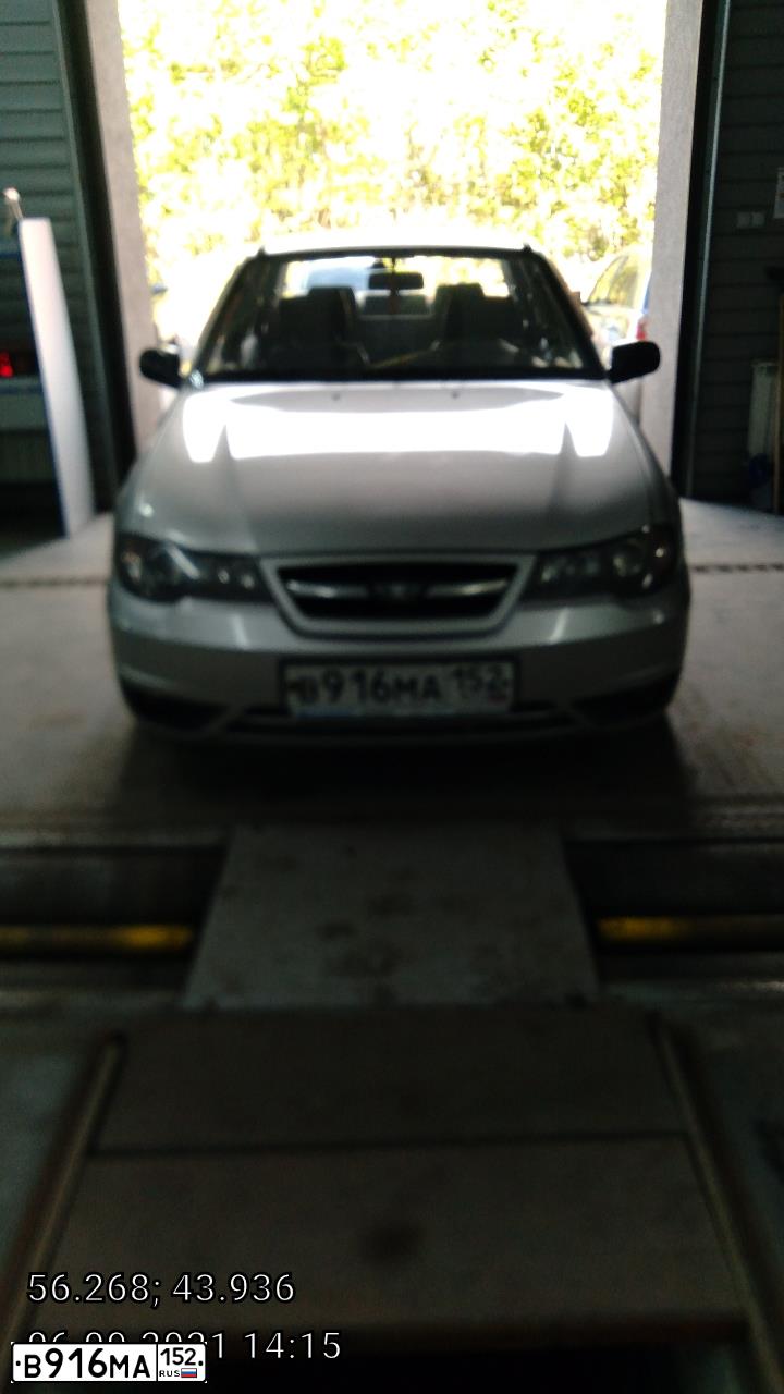 Фото автомобиля DAEWOO NEXIA, 2010 — госномер В916МА152. Цвет: СВЕТЛО-СЕРЫЙ