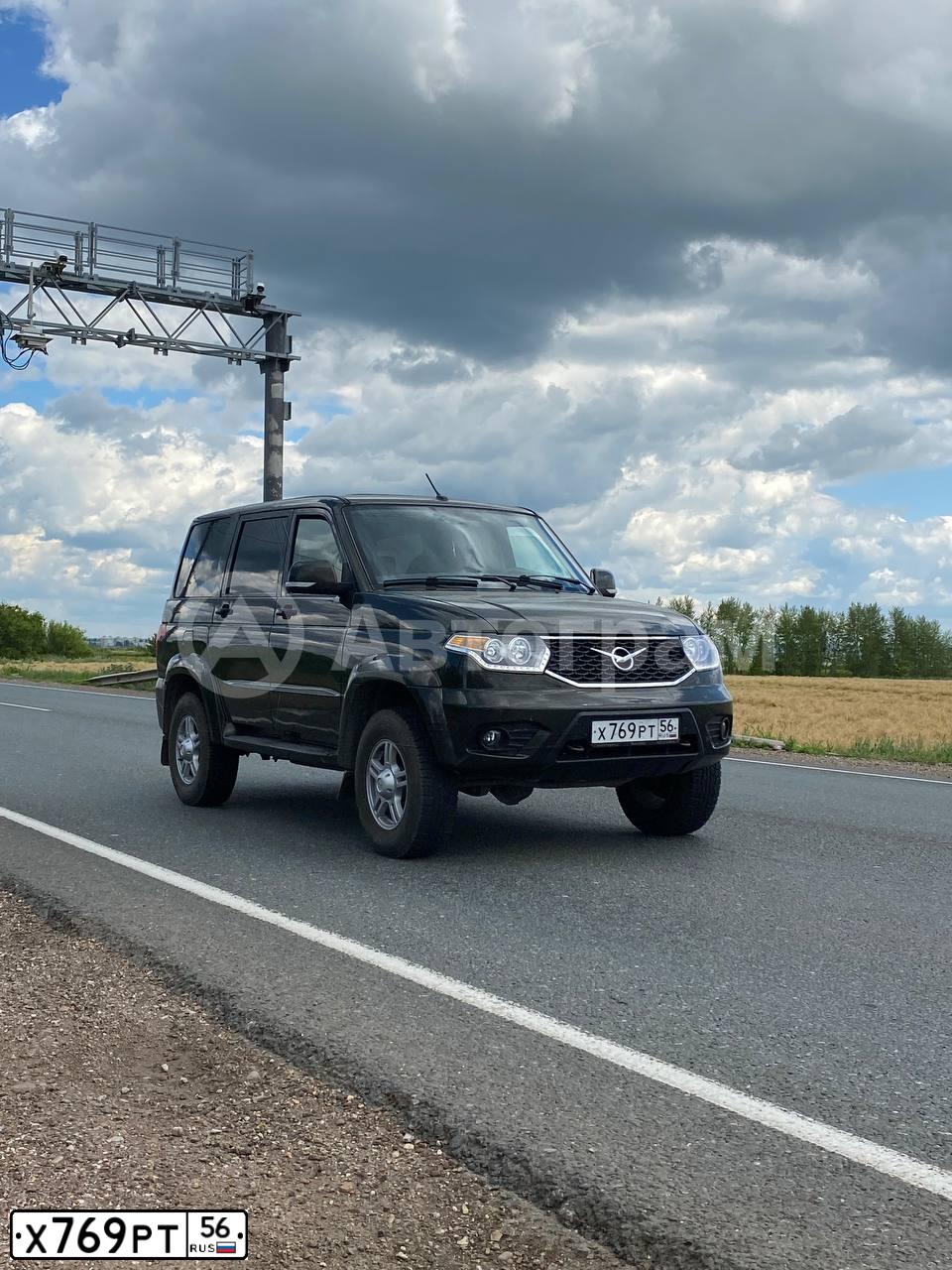 Фото автомобиля UAZ 3163 PATRIOT, 2018 — госномер Х769РТ56. Цвет: ЗЕЛЕНЫЙ МЕТАЛЛИК