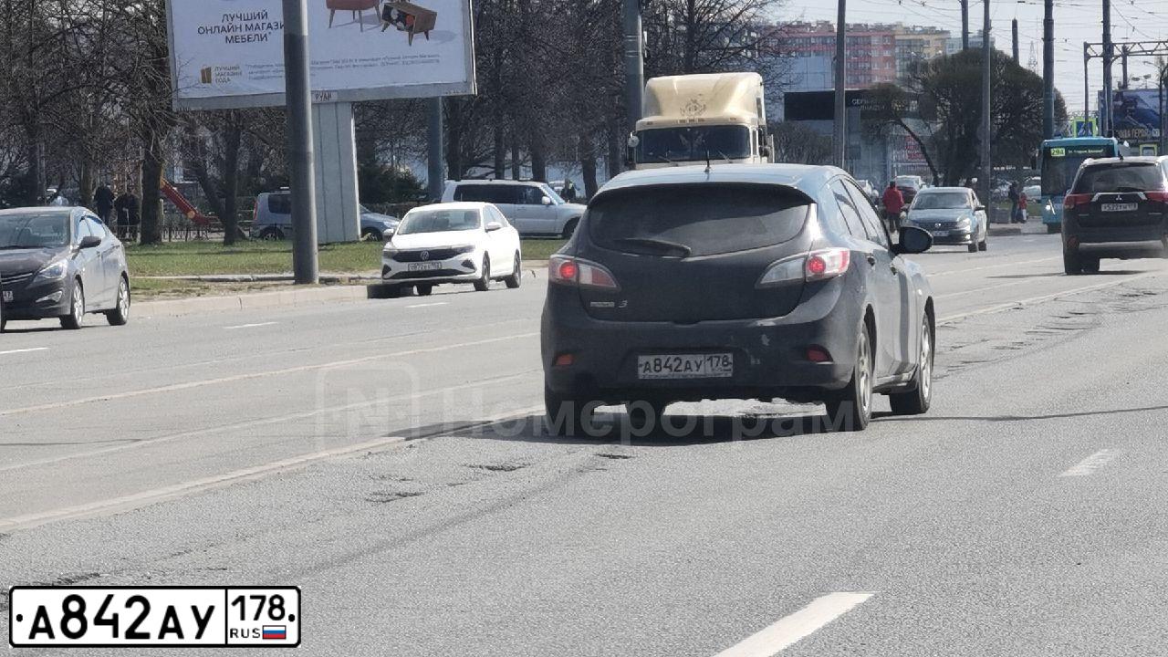 Фото автомобиля MAZDA 3, 2010 — госномер А842АУ178. Цвет: ЧЕРНЫЙ