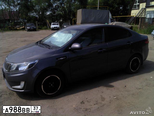 Фото автомобиля KIA RIO, 2012 — госномер К884РВ750. Цвет: Серый