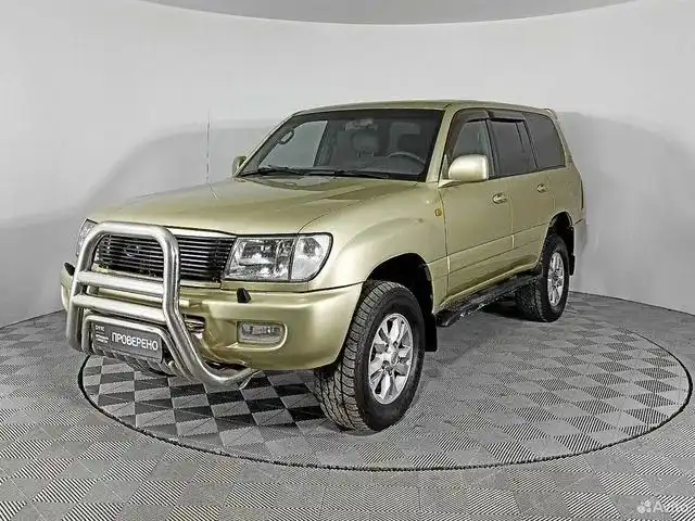 Фото автомобиля TOYOTA LANDCRUISER, 1999 — госномер Е614АТ716. Цвет: ЗОЛОТИСТЫЙ
