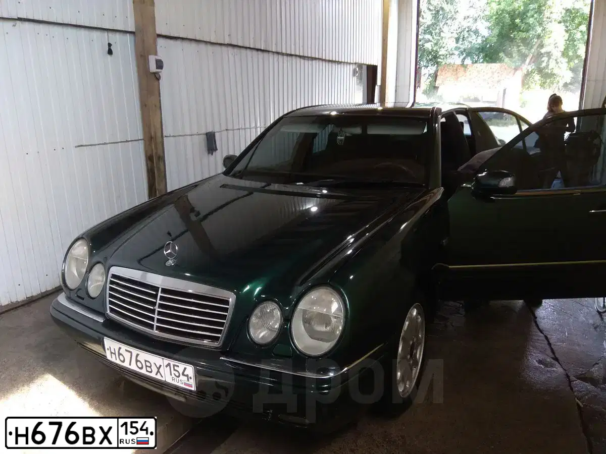 Фото автомобиля MERCEDES E-KLASSE, 1996 — госномер С240ВХ154. Цвет: ЗЕЛЕНЫЙ