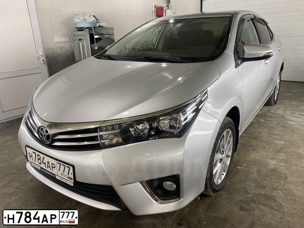 Фото автомобиля TOYOTA COROLLA, 2013 — госномер Н784АР777. Цвет: Серый