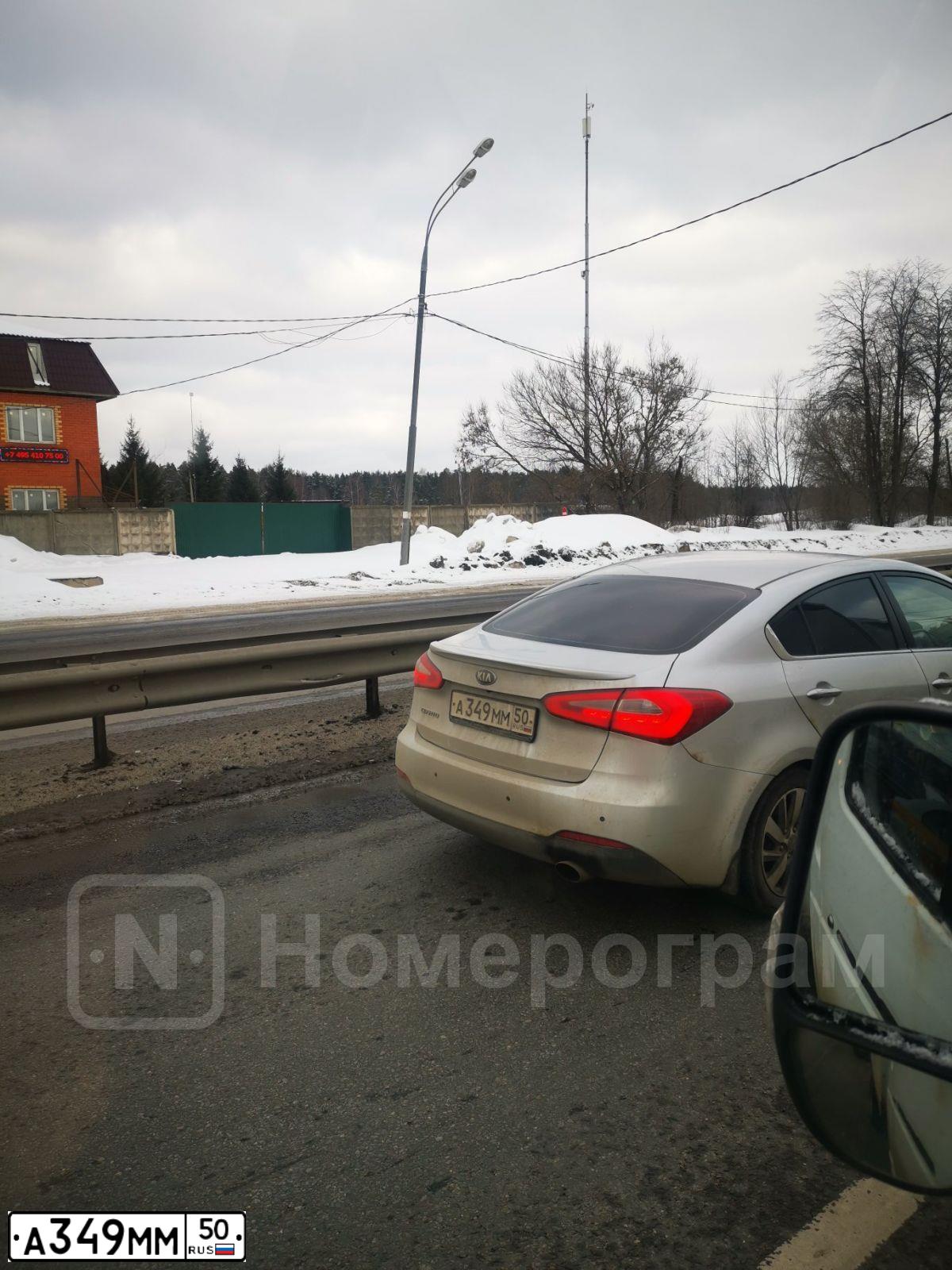 Фото автомобиля GAZ 3110 WOLGA, 2002 — госномер А349ММ50. Цвет: Серый