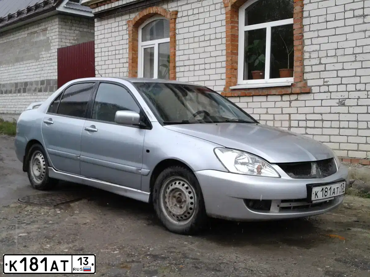 Фото автомобиля MITSUBISHI LANCER, 2005 — госномер К489КУ73
