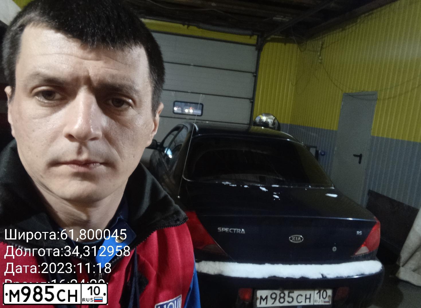 Фото автомобиля KIA SPECTRA, 2008 — госномер М985СН10. Цвет: Темно-синий