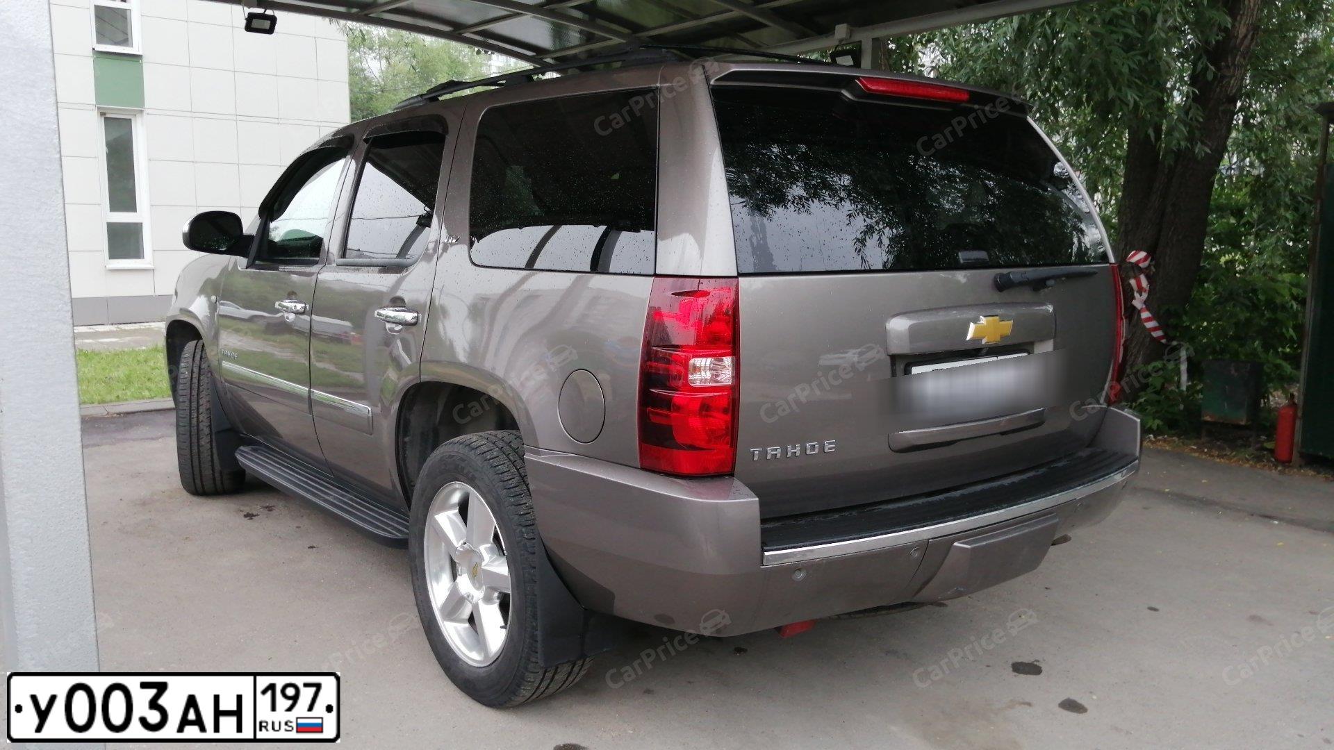 Фото автомобиля EXEED TXL, 2022 — госномер Р696ЕР977. Цвет: СЕРЫЙ