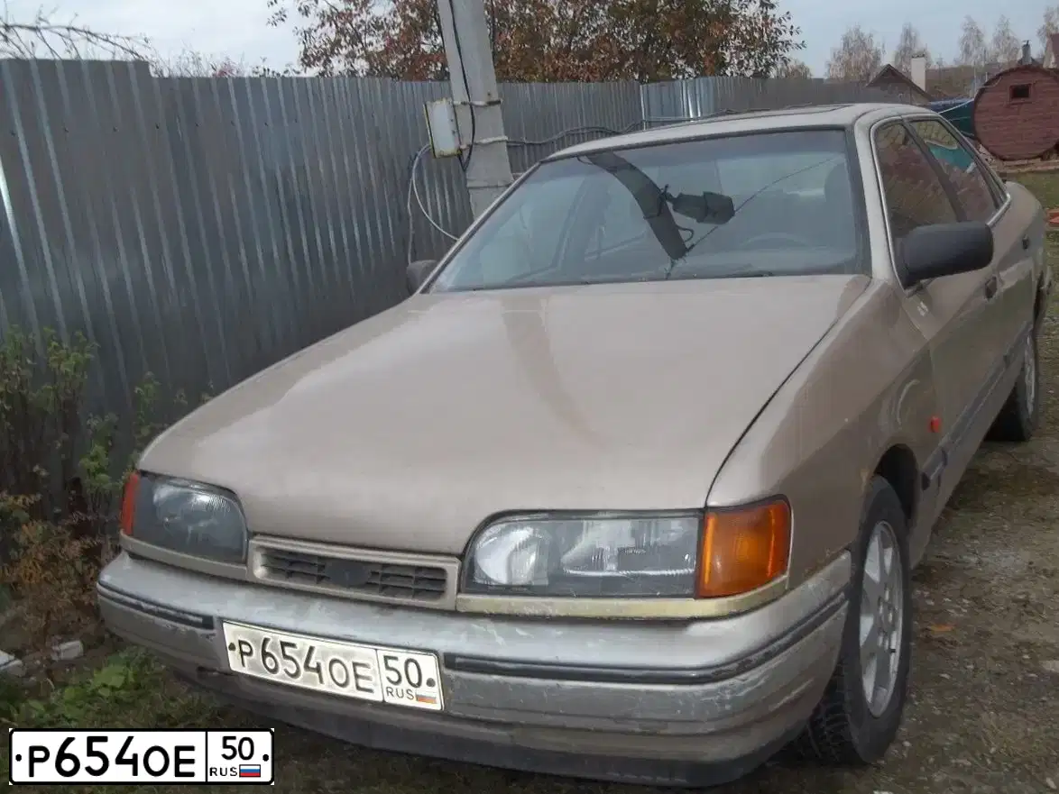 Фото автомобиля ГАЗ 2705, 1997 — госномер Р654ОЕ50. Цвет: БЕЛЫЙ
