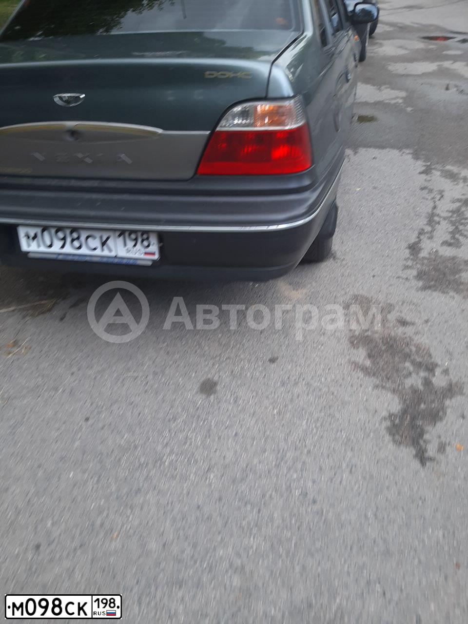 Фото автомобиля DAEWOO NEXIA, 2005 — госномер М098СК198. Цвет: СВЕТЛО-ЗЕЛЕНЫЙ
