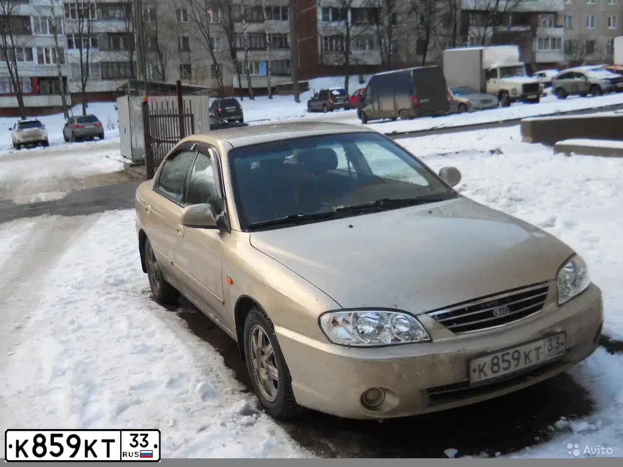 Фото автомобиля KIA SPECTRA, 2008 — госномер О285РО33. Цвет: Золотисто-бежевый