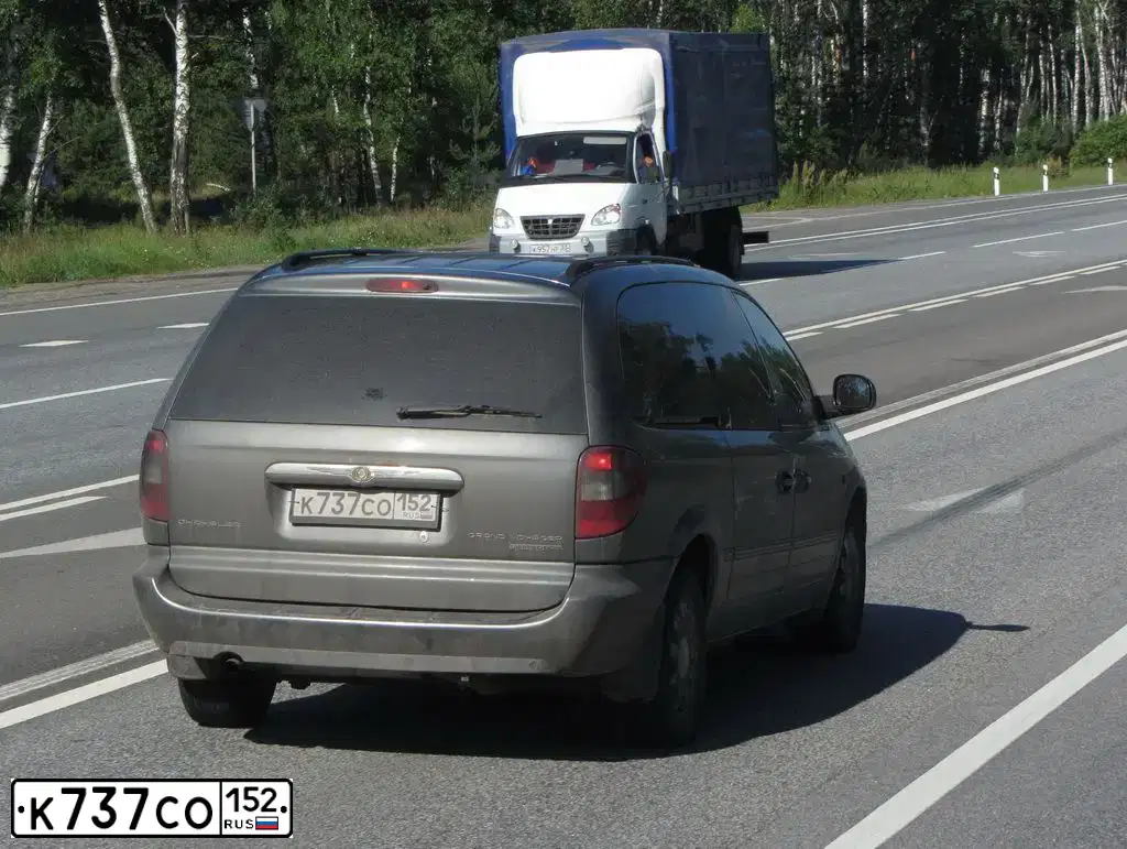Фото автомобиля CHRYSLER GRAND VOYAGER, 2007 — госномер К737СО152. Цвет: Серый