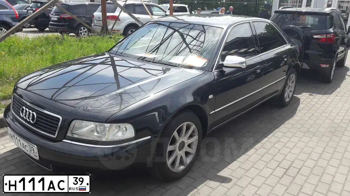 Фото автомобиля AUDI A8, 1999 — госномер Н111АС39. Цвет: ЧЕРНЫЙ