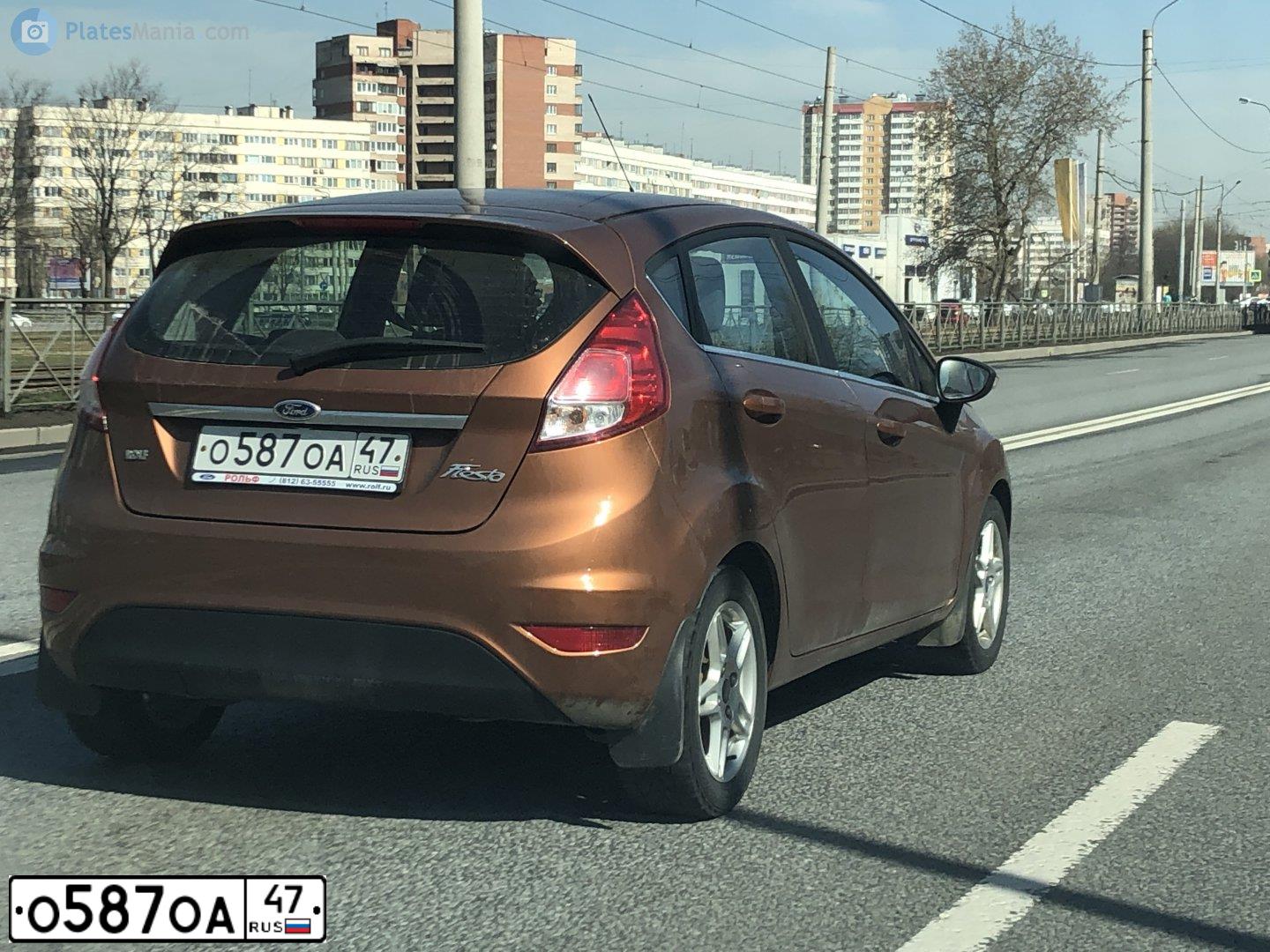 Фото автомобиля FORD FIESTA / ASPIRE, 2015 — госномер О587ОА47. Цвет: КОРИЧНЕВЫЙ