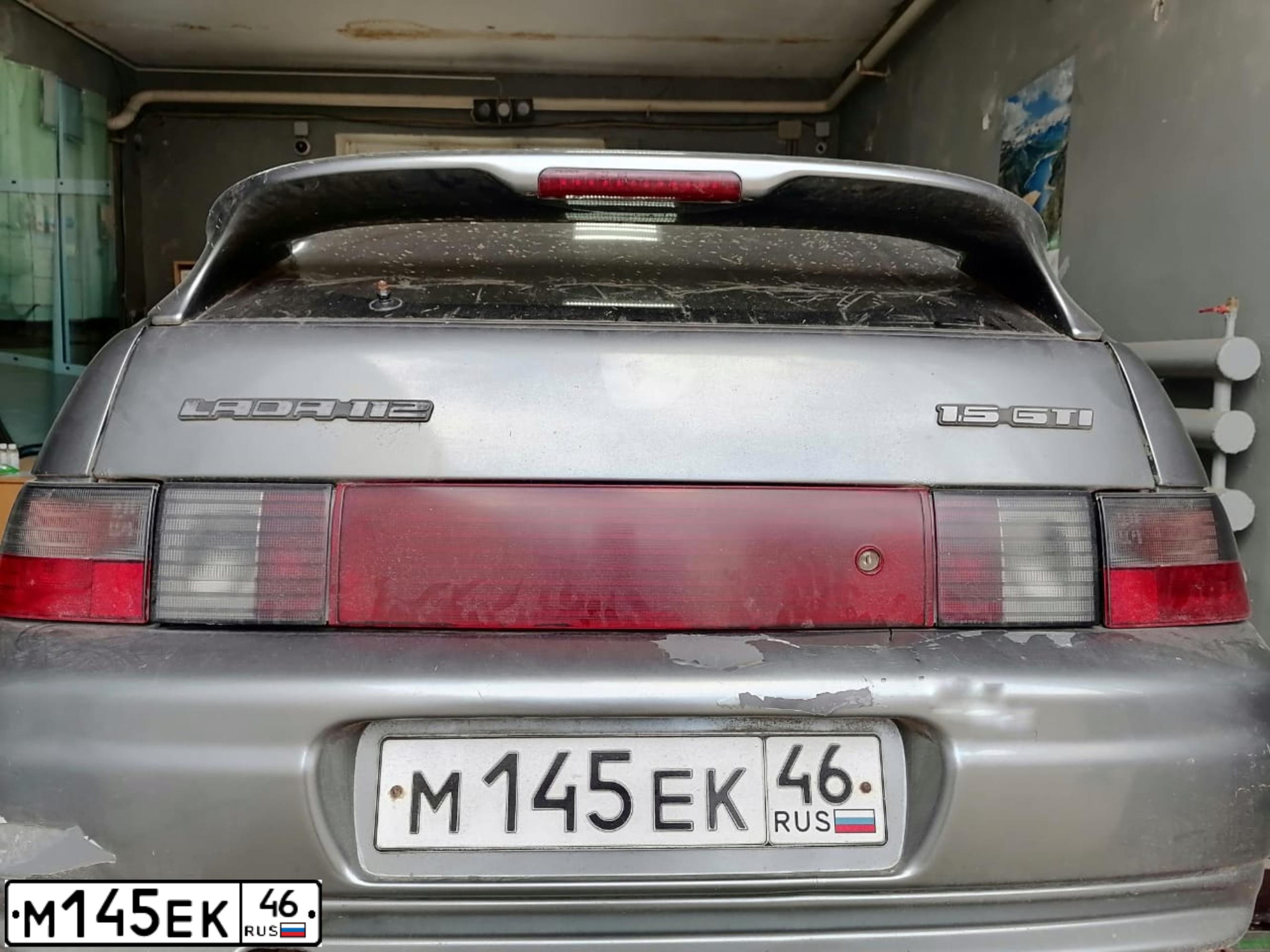 Фото автомобиля LADA 2112, 2004 — госномер М145ЕК46. Цвет: СРЕДНИЙ СЕРО-ЗЕЛЕНЫЙ МЕТЕЛЛИК
