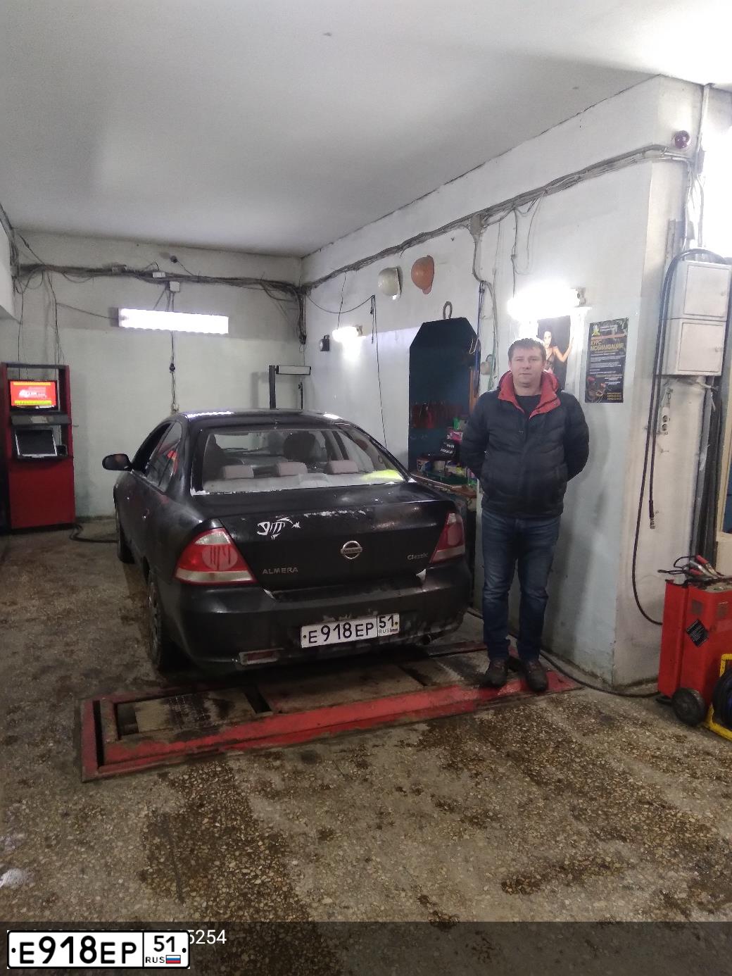 Фото автомобиля NISSAN ALMERA, 2006 — госномер Е918ЕР51. Цвет: ЧЕРНЫЙ