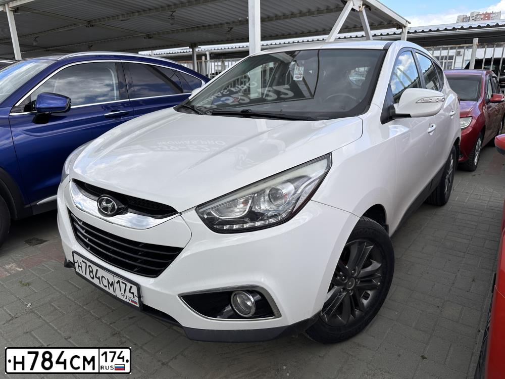 Фото автомобиля HYUNDAI IX35, 2013 — госномер Н784СМ174. Цвет: БЕЛЫЙ