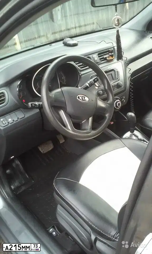 Фото автомобиля KIA RIO, 2011 — госномер А215ММ73. Цвет: СЕРЫЙ