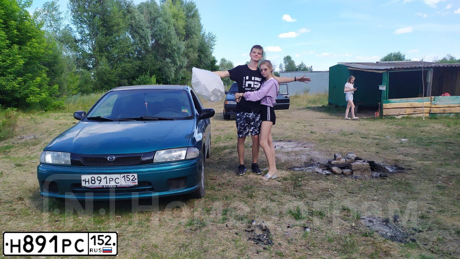 Фото автомобиля MAZDA 323, 1999 — госномер Н891РС152. Цвет: ЗЕЛЕНЫЙ