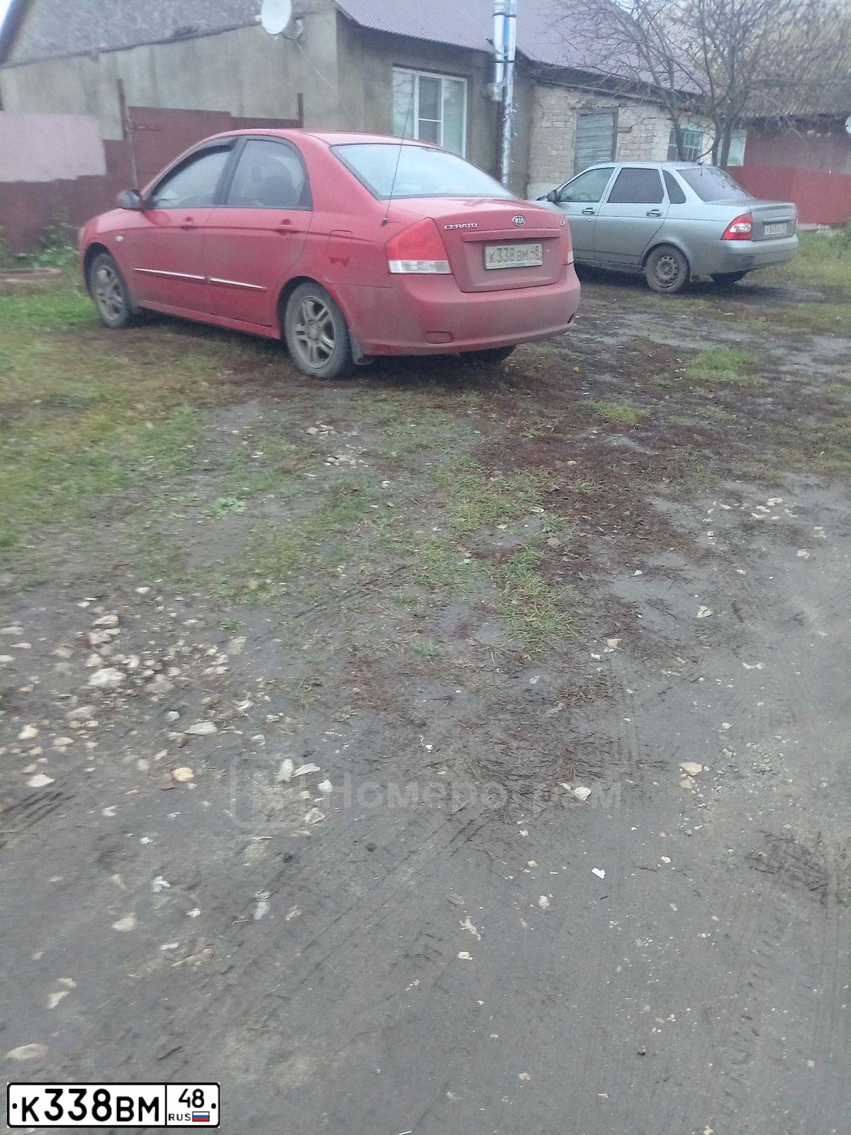 Фото автомобиля KIA CERATO, 2008 — госномер К338ВМ48. Цвет: КРАСНЫЙ