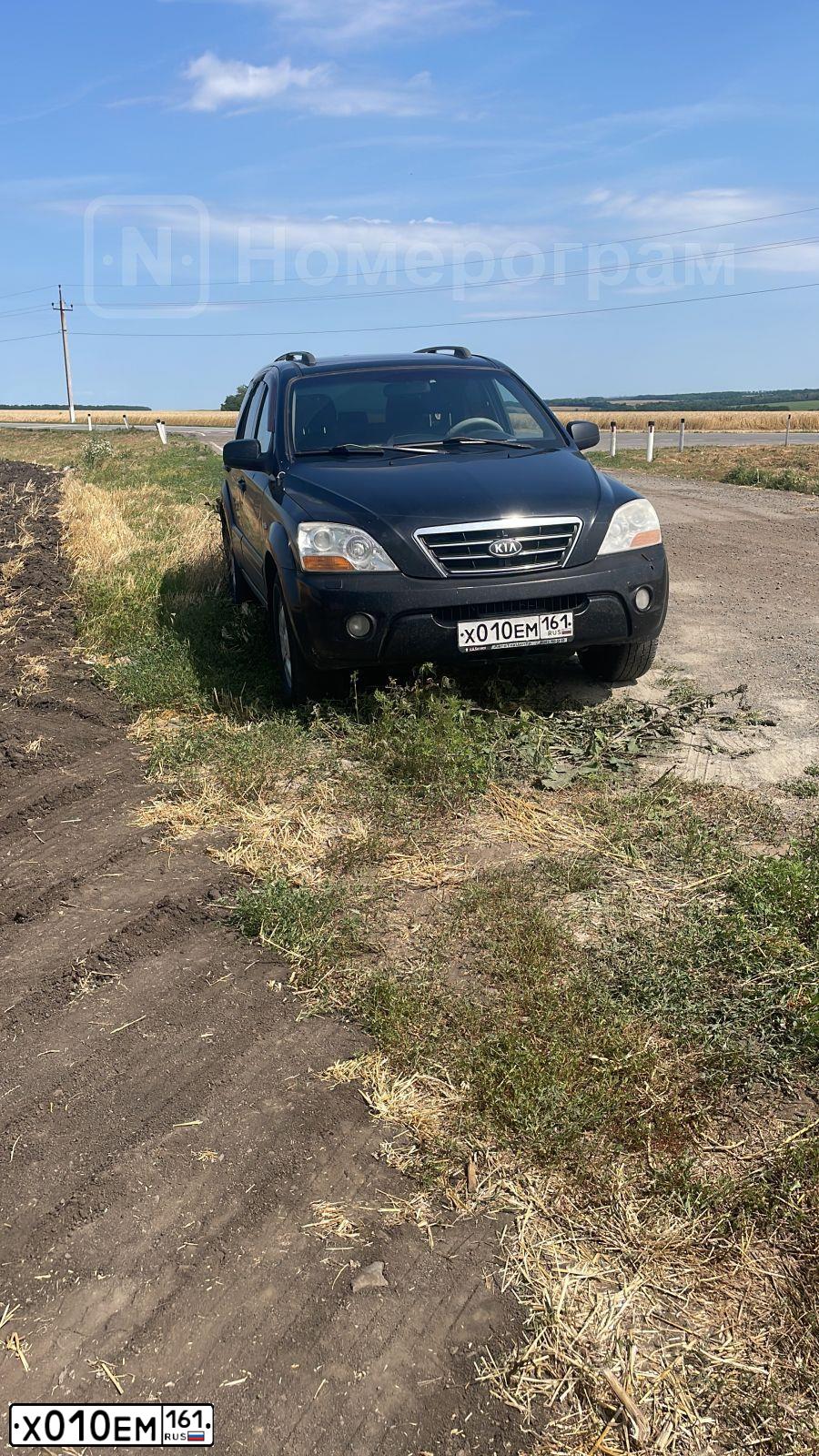 Фото автомобиля KIA SORENTO, 2008 — госномер Х010ЕМ61. Цвет: ЧЕРНЫЙ ГРАФИТ