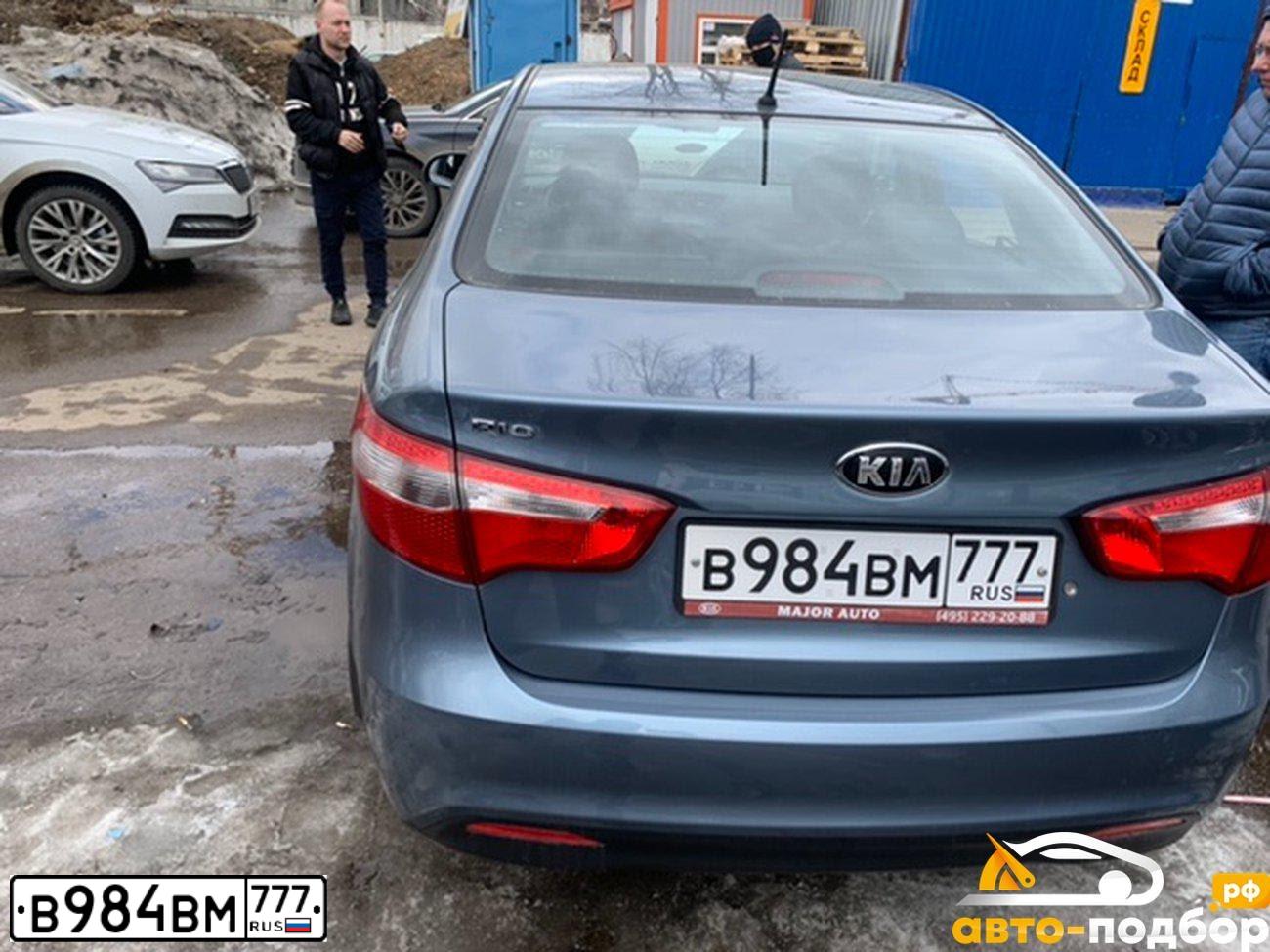 Фото автомобиля KIA RIO, 2014 — госномер В200УН799. Цвет: голубой