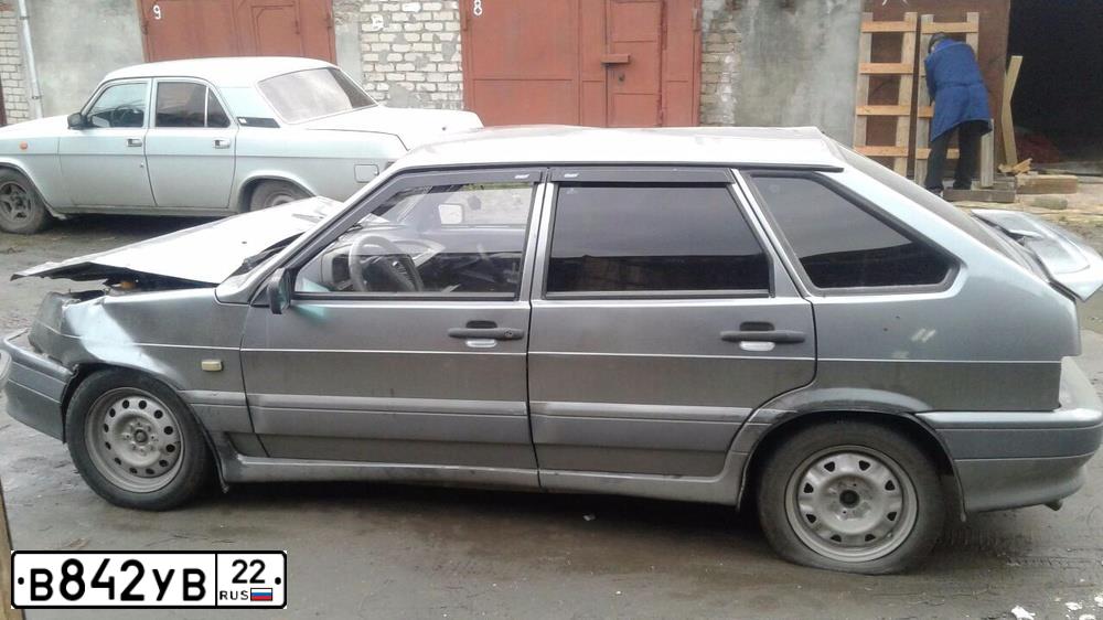 Фото автомобиля LADA 2114 SAMARA, 2005 — госномер Х077СС24. Цвет: Серый