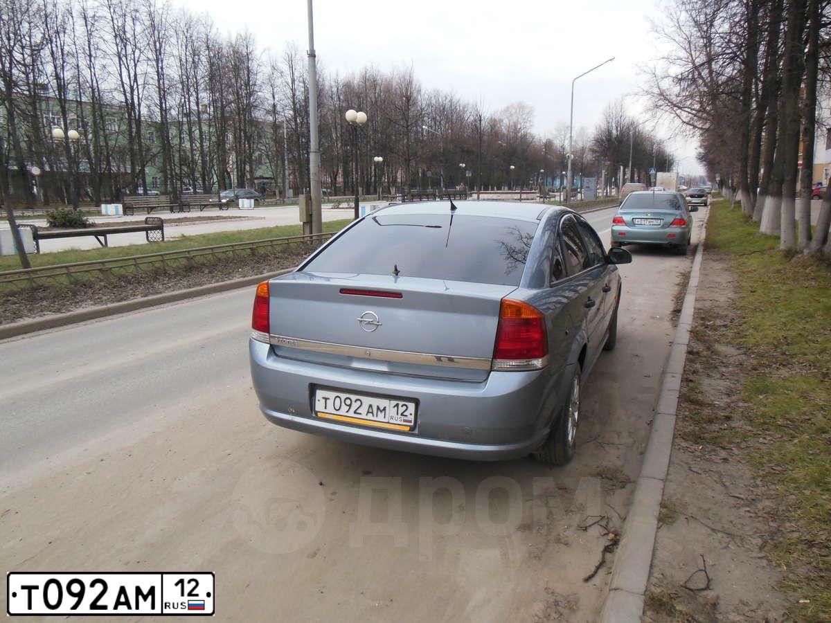 Фото автомобиля OPEL VECTRA, 2006 — госномер Т092АМ12. Цвет: СЕРО-ГОЛУБОЙ