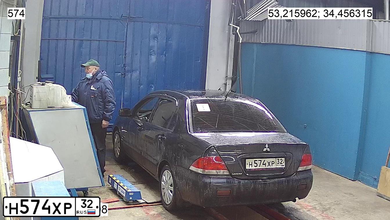 Фото автомобиля MITSUBISHI LANCER, 2007 — госномер Х233ОМ62. Цвет: ЧЕРНЫЙ