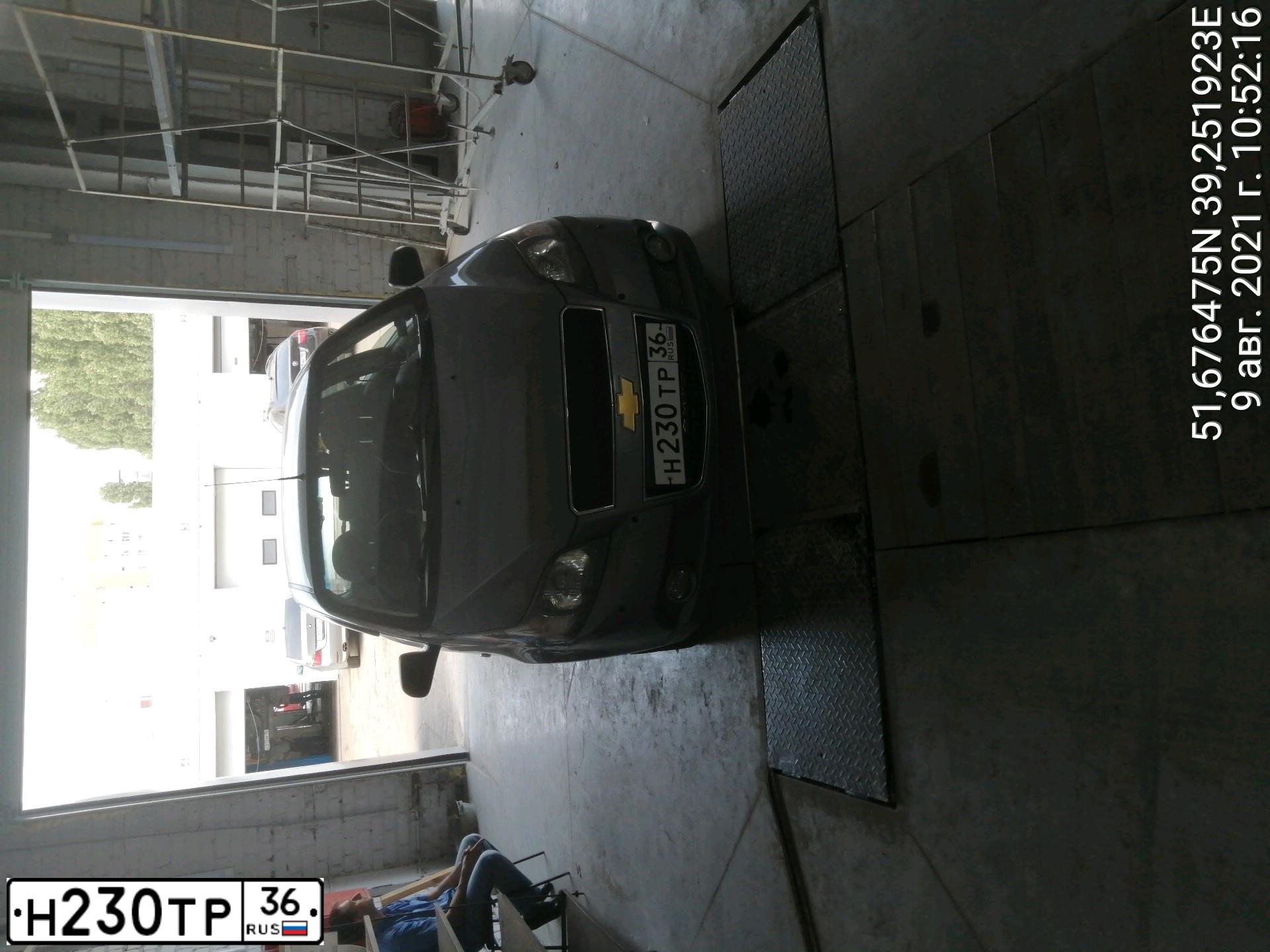 Фото автомобиля CHEVROLET T AVEO, 2011 — госномер Н230ТР36. Цвет: Серый