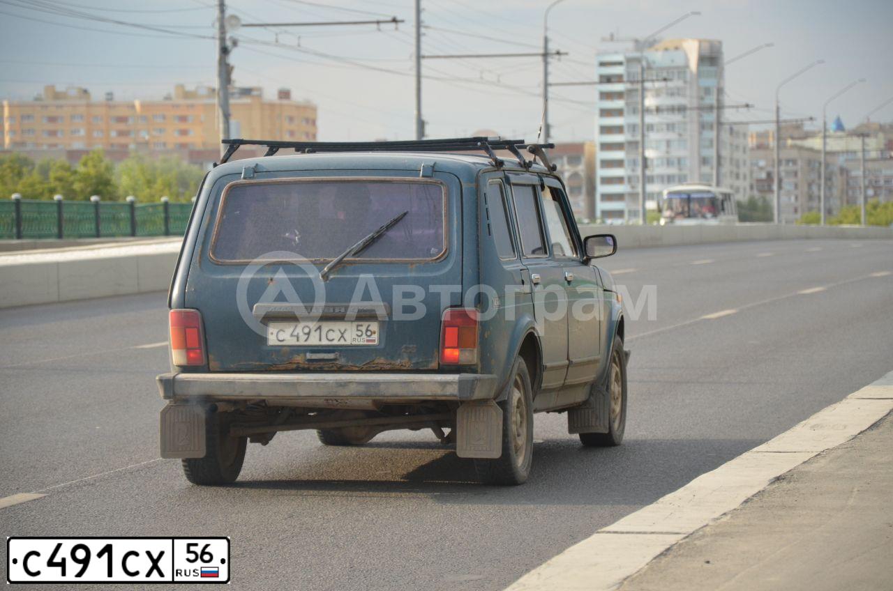 Фото автомобиля LADA 2131 NIVA, 1999 — госномер С491СХ56. Цвет: СИНЕ-ЗЕЛЕНЫЙ