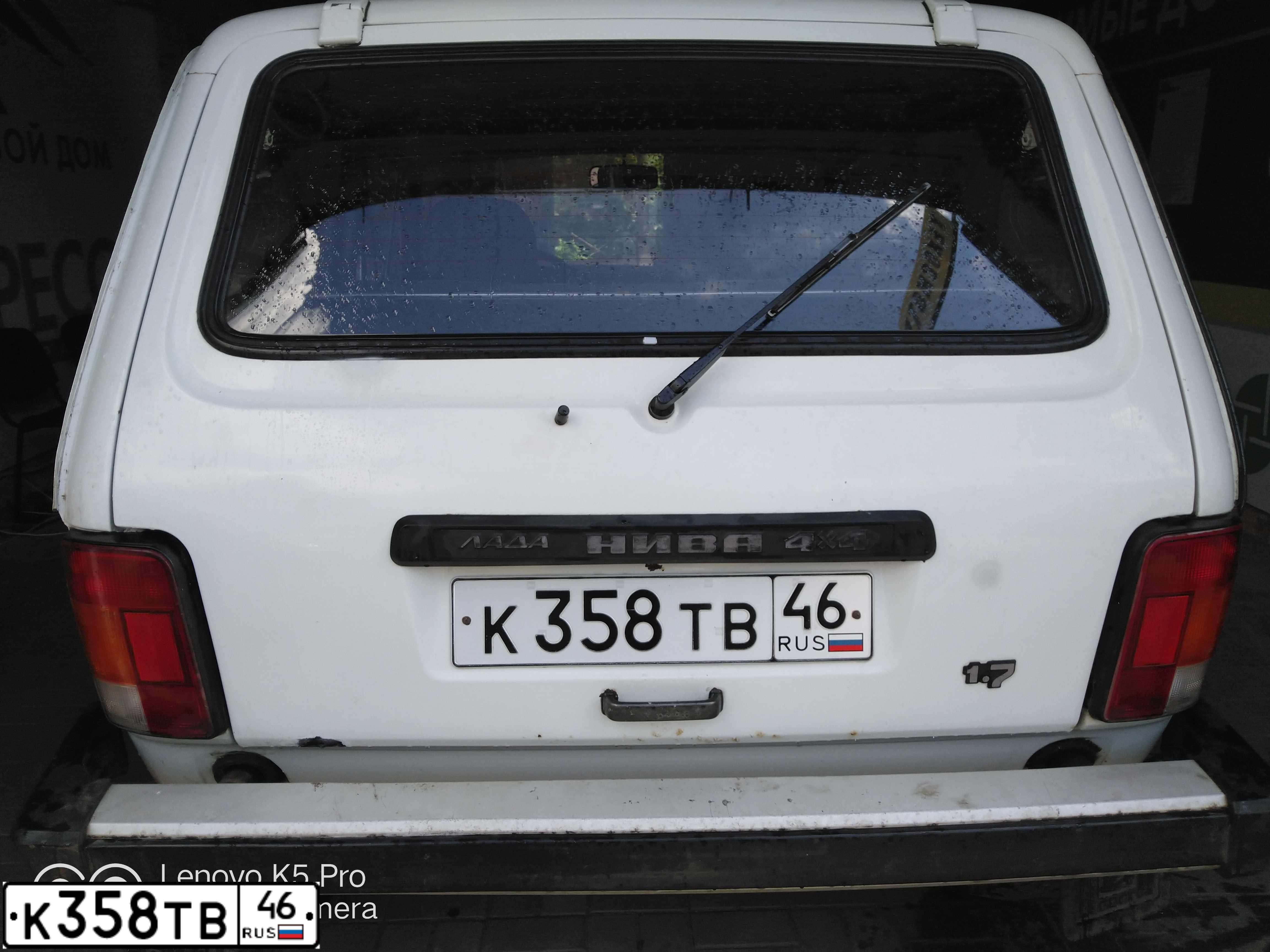 Фото автомобиля LADA 2121 NIVA, 1997 — госномер В044УС18. Цвет: Белый