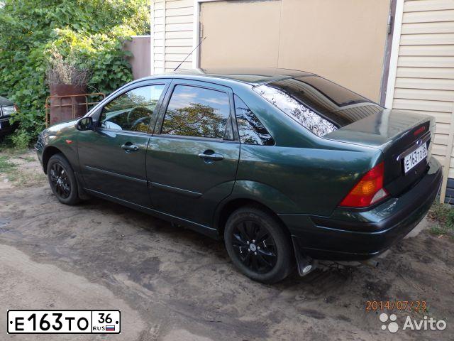 Фото автомобиля FORD FOCUS, 2004 — госномер А457АН136. Цвет: Темно-зеленый