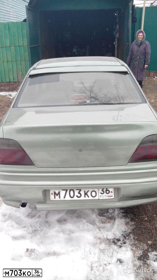 Фото автомобиля LADA 2107, 1990 — госномер У003АТ36. Цвет: Белый