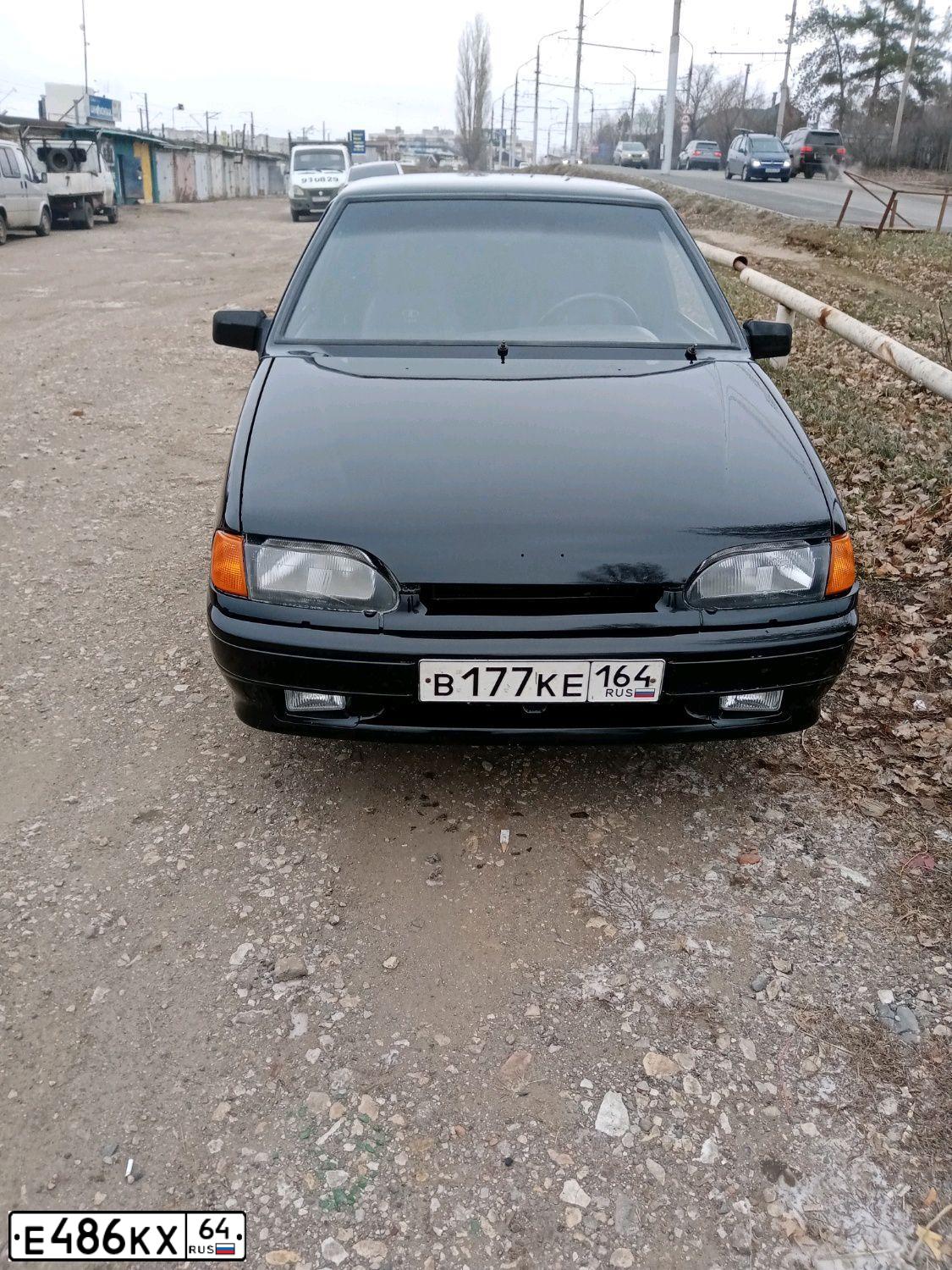 Фото автомобиля LADA 2115 SAMARA, 2008 — госномер Е486КХ64. Цвет: темно-зеленый металлик