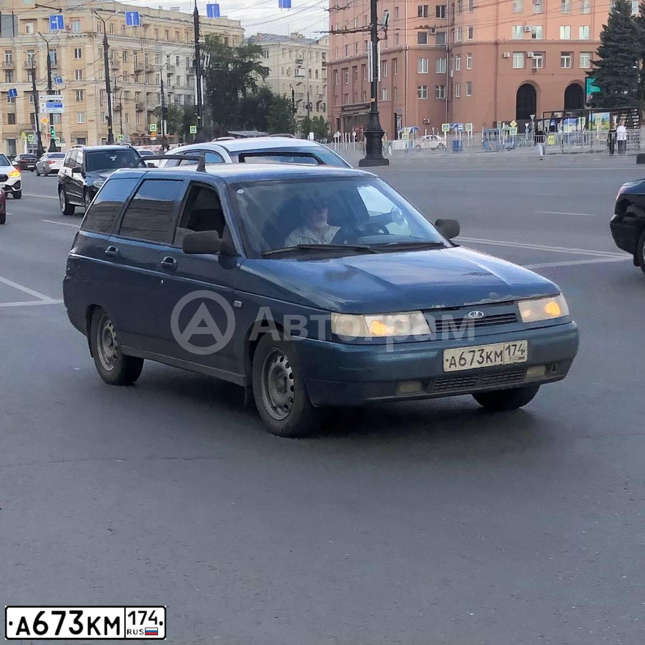 Фото автомобиля LADA 2111 LADA, 2004 — госномер А673КМ174. Цвет: Темно-зеленый