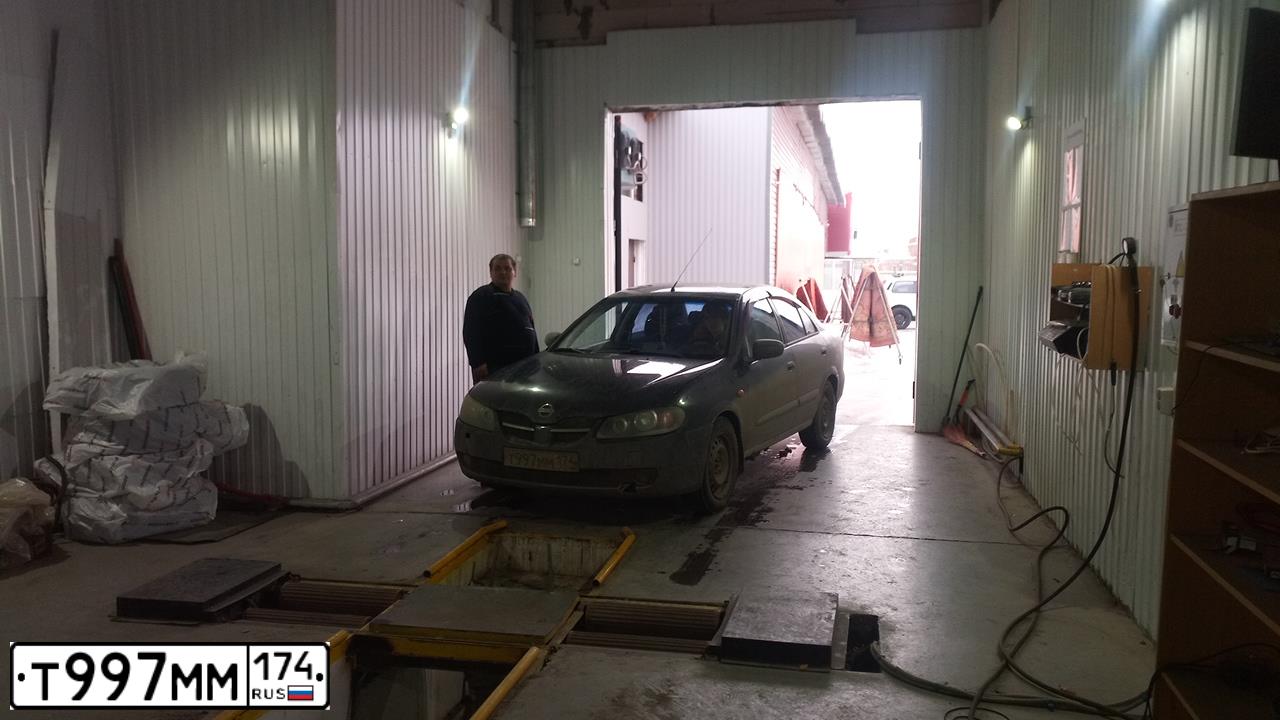 Фото автомобиля NISSAN ALMERA, 2005 — госномер Т997ММ174. Цвет: ЧЕРНЫЙ