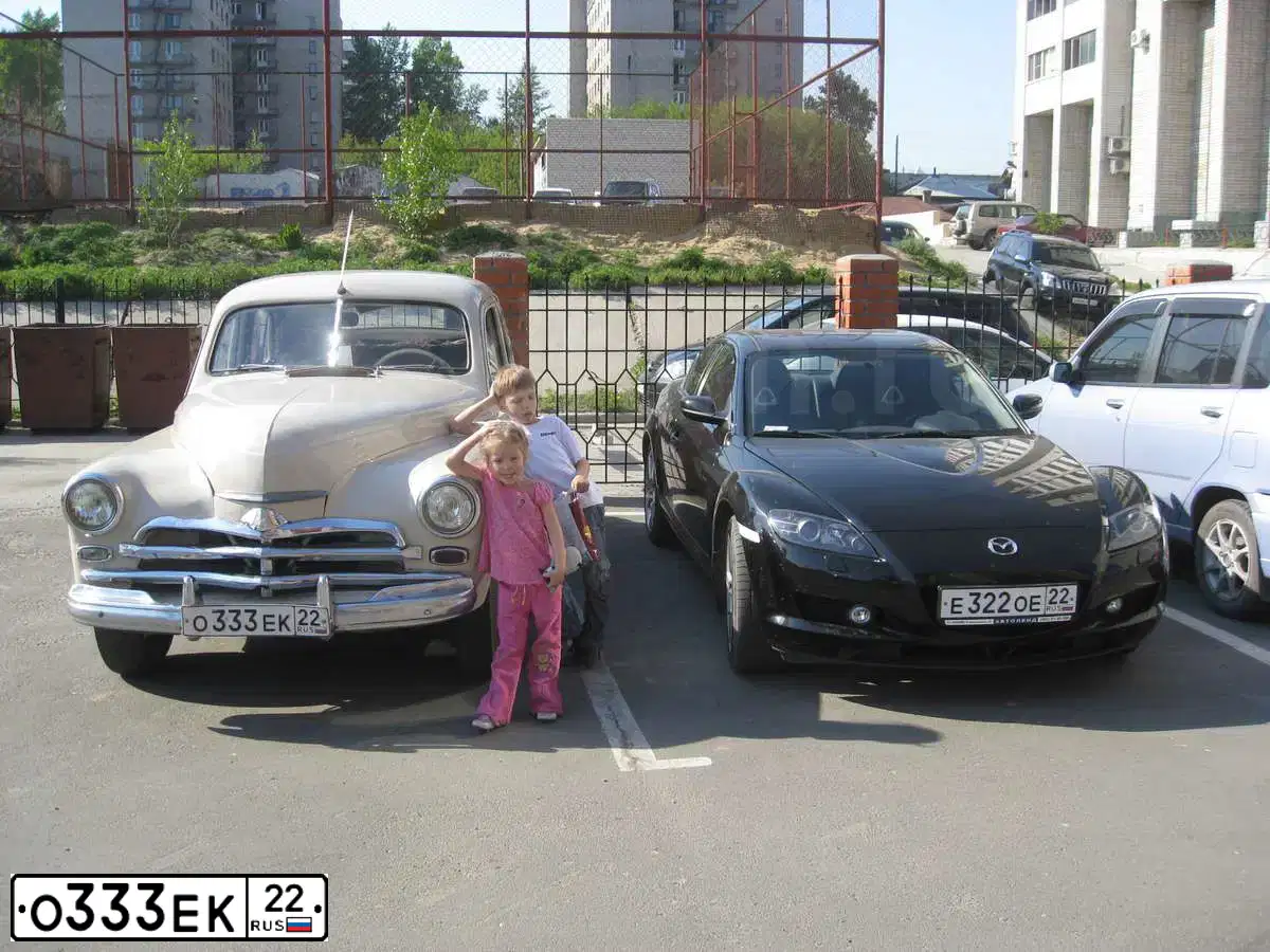 Фото автомобиля SUBARU IMPREZA, 2014 — госномер Е898КХ122. Цвет: Белый