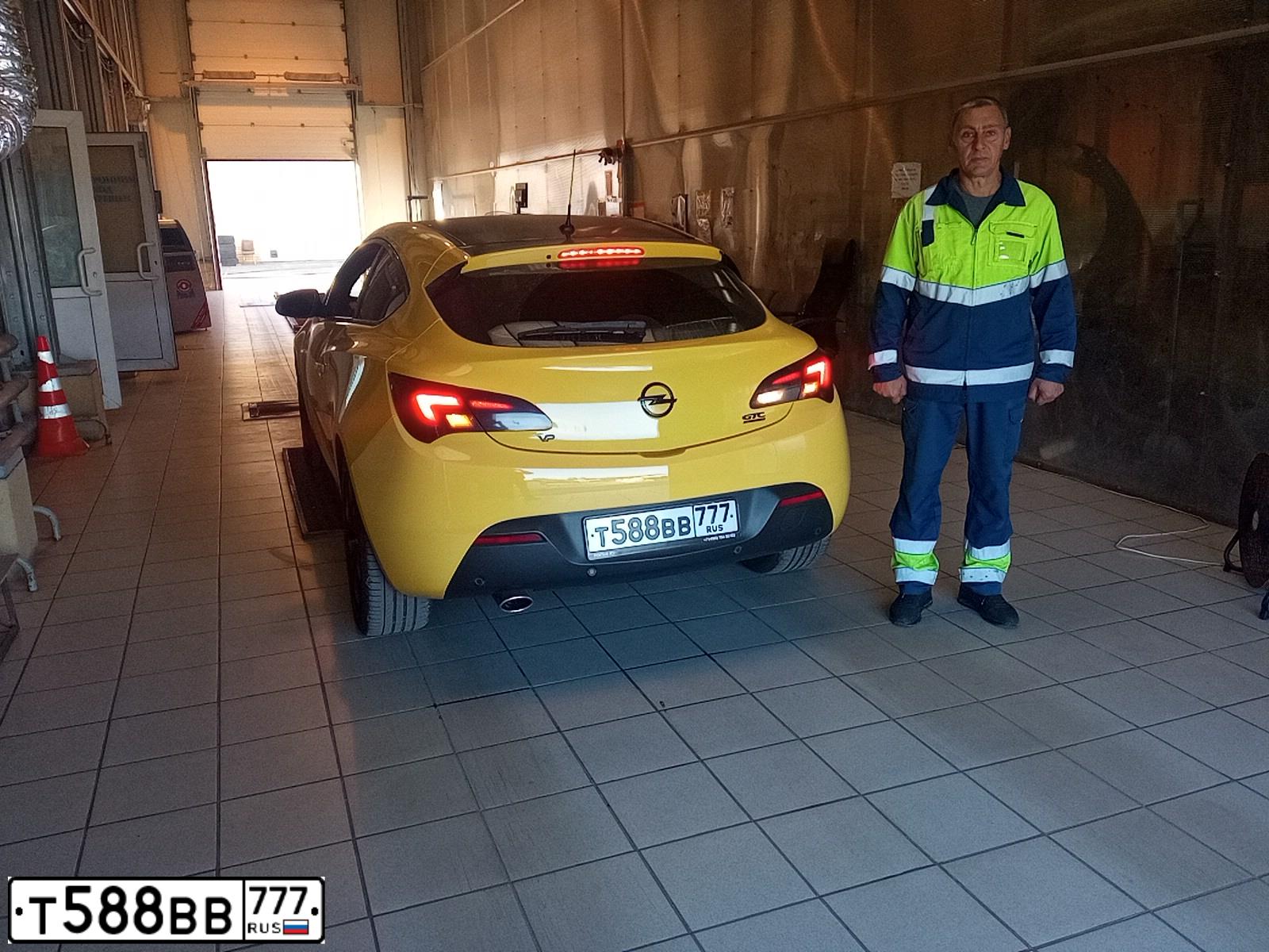 Фото автомобиля OPEL ASTRA, 2013 — госномер Т588ВВ777. Цвет: ЖЁЛТЫЙ