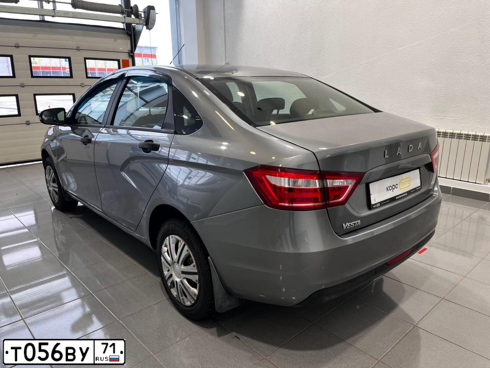 Фото автомобиля LADA VESTA, 2016 — госномер Т056ВУ71. Цвет: СЕРЫЙ