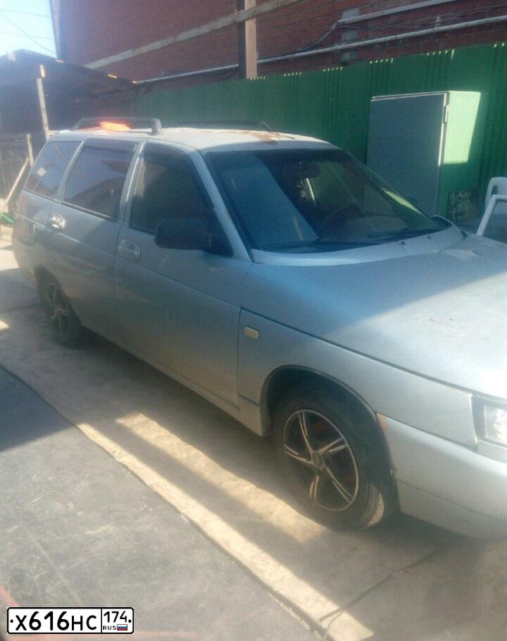 Фото автомобиля LADA 2111, 2001 — госномер Т208ВХ174. Цвет: СЕРЕБРИСТО-ГОЛУБОЙ