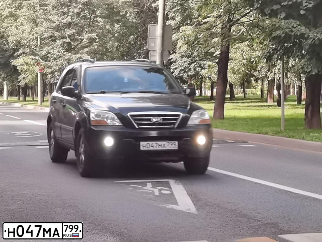 Фото автомобиля KIA SORENTO, 2008 — госномер Н047МА799. Цвет: ЧЕРНЫЙ